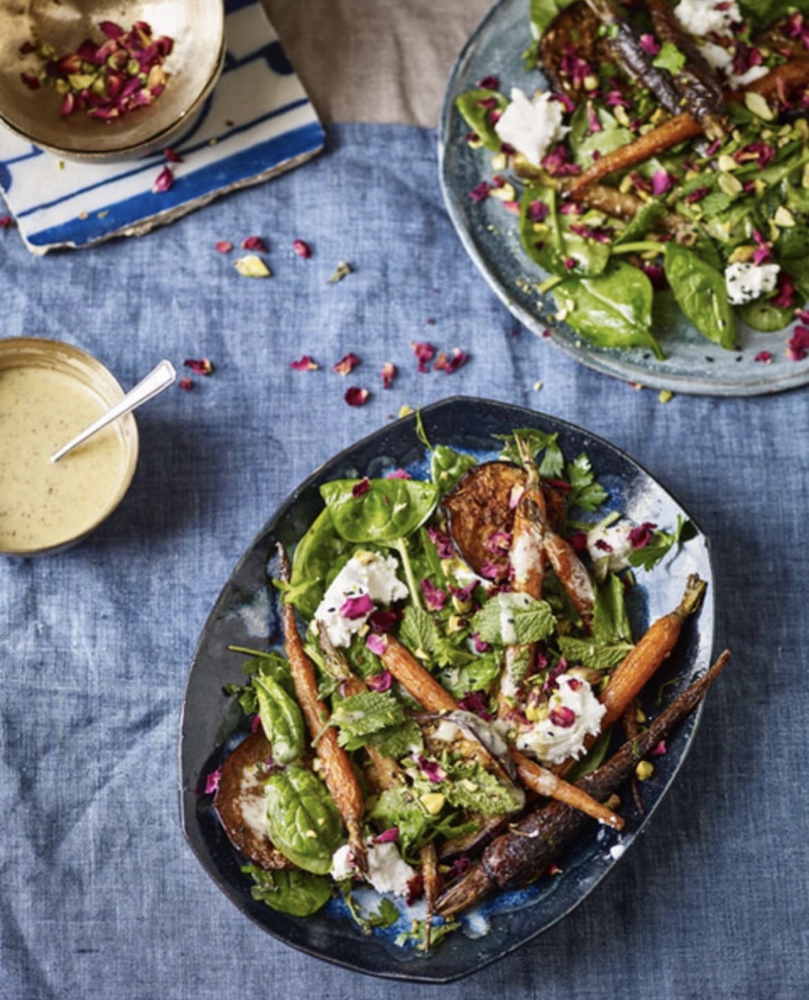 Ras el hanout aubergine and carrots, goats cheese and sumactahini dressing by Eve Kalinik